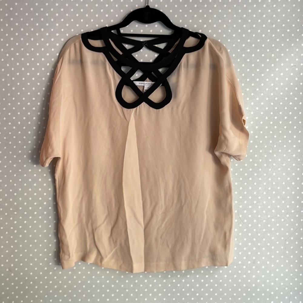 Diane von Fursternberg short sleeved blouse.